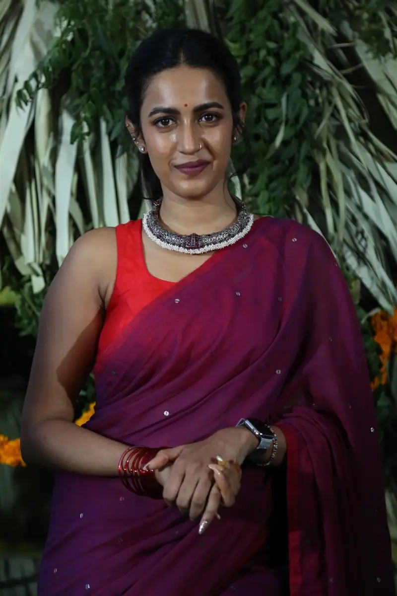 Niharika Konidela Stills in Violet Saree Sleeveless Orange Blouse